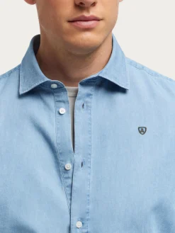 POLERA DENIM CELESTE