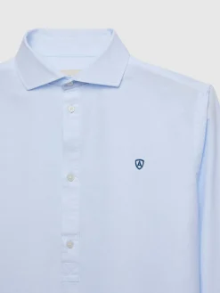 POLERA PIN POINT CELESTE